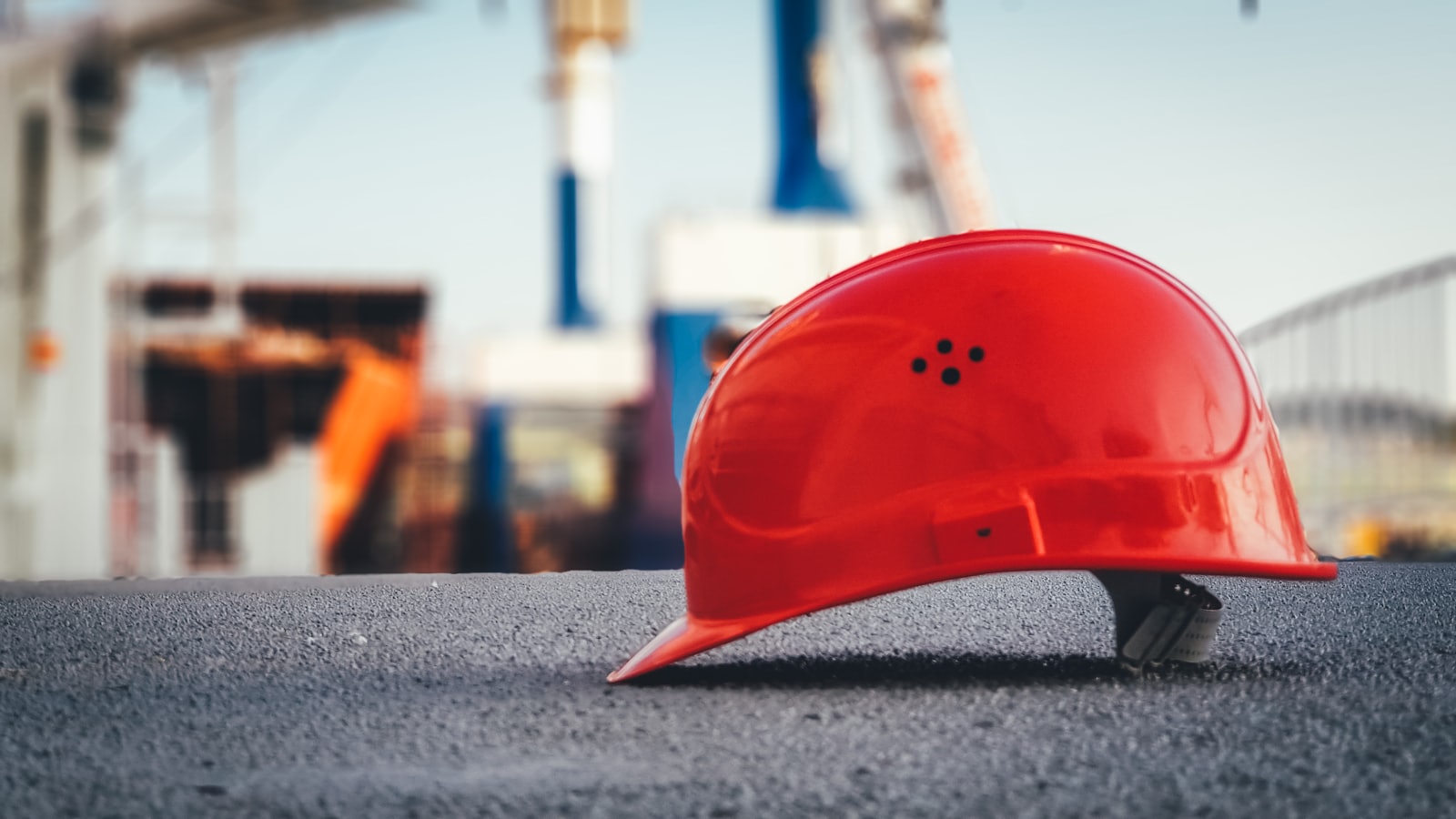 Safety helmet resting on a site table, ready for the next visit