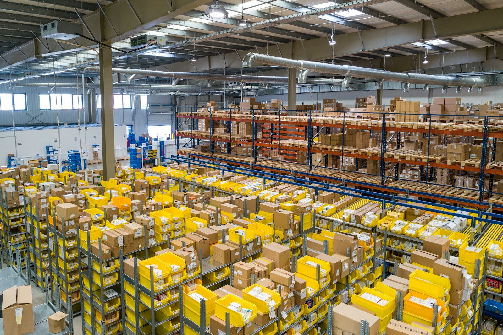 Warehouse racks stocked with construction and office supplies