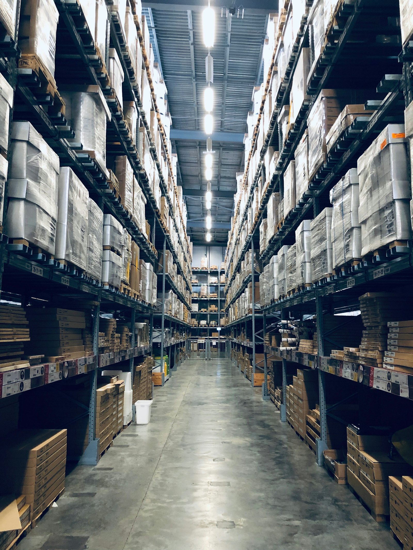 Stacked construction material supplies staged for phased delivery